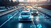 Self-driving cars with digital interface overlays move along a busy motorway at dusk.