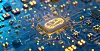 Glowing chip with an electric car symbol on a blue circuit board.