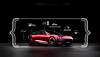 Red futuristic concept car in a dark studio with white glowing frame and technical graphics.