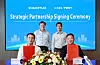 Four men pose at a signing ceremony with documents, flowers and Schaeffler and CATL branding on a blue backdrop.