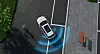 Self-driving car on a city street with blue detection arcs around it.