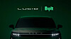 Front view of a Lucid electric car under green lighting with Lucid and Bolt logos above.